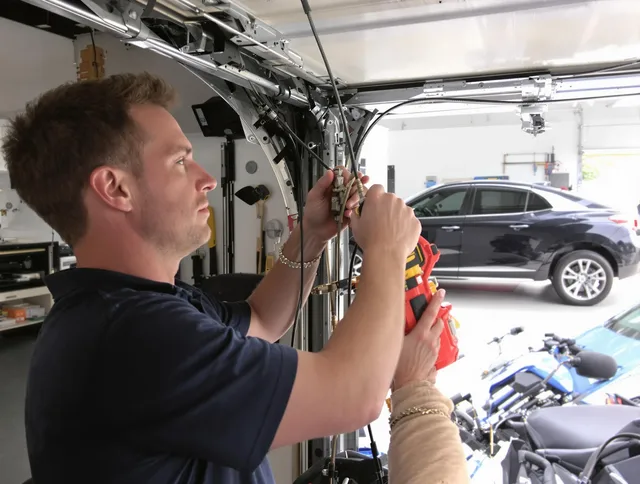 Boca Raton Garage Door Repair safety certified technician performing cable replacement in Boca Raton
