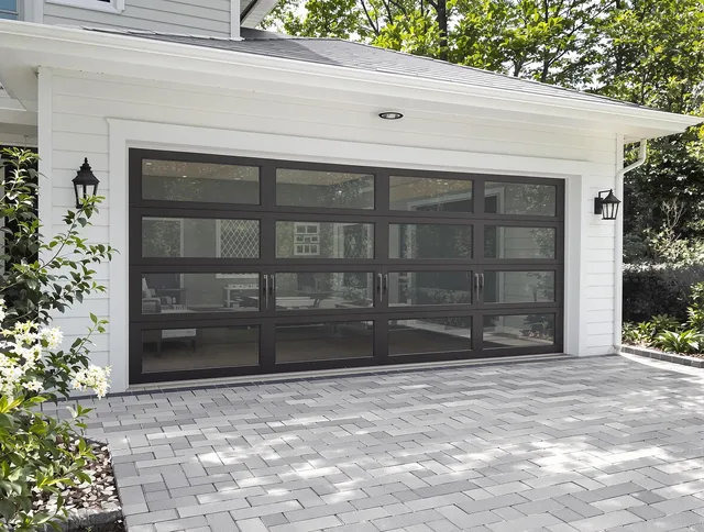 Boca Raton Garage Door Repair design specialist presenting custom garage door options to Boca Raton homeowner