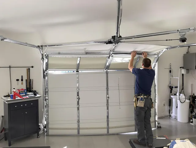 Boca Raton Garage Door Repair specialist performing precise section replacement on Boca Raton garage door